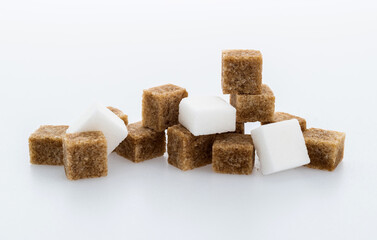 Pile of brown and white sugar cubes