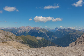 Awesome dolomite panorama from the Latemar Massif, towards Fassa Valley. Mount Pelmo, Marmolada and Mount Civetta are visible. UNESCO world heritage site, Trentino-Alto Adige, Italy, Europe