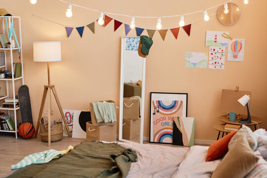 Background image of teens bedroom with colorful decorations and posters, copy space