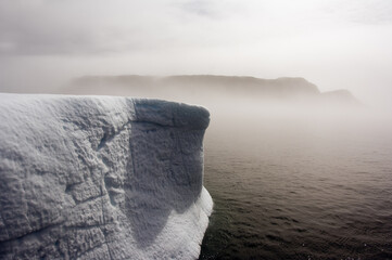 Iceberg in front of Monumental Island in the fog, Davis Strait, Nunavut, Canada © MC Photos