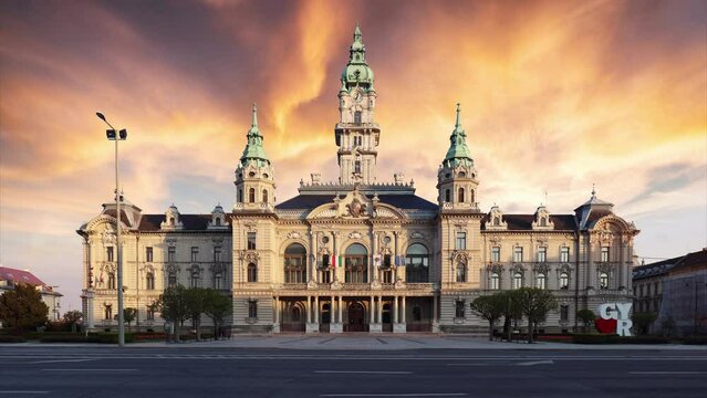 Hungary - Dramatic sunset over Gyor town hall, time lapse