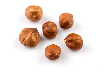 Hazelnuts on the white background