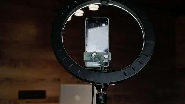 Ring lamp with smartphone holder. Professional lighting for bloggers and content creators.