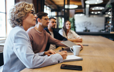 Business people having a conference meeting in a modern workplace