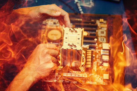 Repair of a computer, detail of disassembled computer. Fire effect