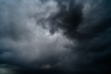 Obraz premium storm sky, dark dramatic clouds during thunderstorm, rain and wind, extreme weather, abstract background
