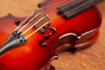 Fototapeta premium violin in vintage style on wood background