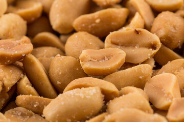 Fototapeta na wymiar large amount of peeled salted peanuts
