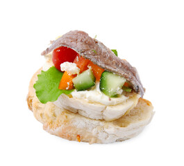 Delicious bruschettas with anchovies, cream cheese, tomatoes, bell peppers and cucumbers isolated on white