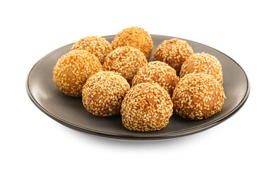 Plate of delicious sesame balls on white background