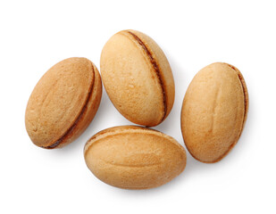 Delicious nut shaped cookie with boiled condensed milk on white background, top view