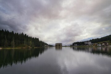 Beautiful landscape of a lake in Dolomites on a cloudy day