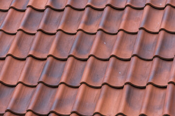 Red tiles roof background