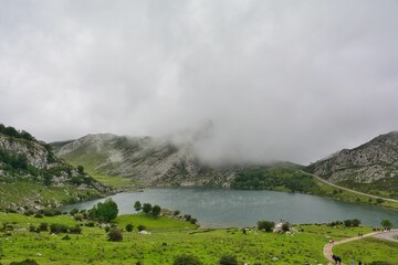 Beautiful landscape of a lake in rocky mountains on a cloudy day