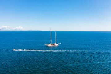 Sailing ship anchored at sea