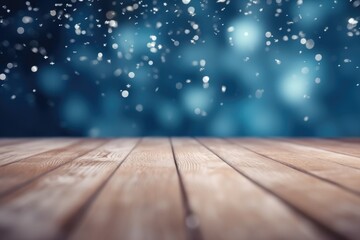 Naklejka na ściany i meble Beautiful winter flakes of snow fall and sparkle on light. Blurred defocused blue background and empty wooden flooring. Ai generative.