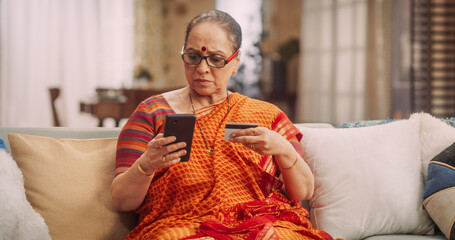 Mother and Daughter Using Laptop: Bonding Over Shared Interests, Doing Online Shopping for best e-Commerce Deals and Clothing Sales. Celebrating Family Moments and Togetherness. 