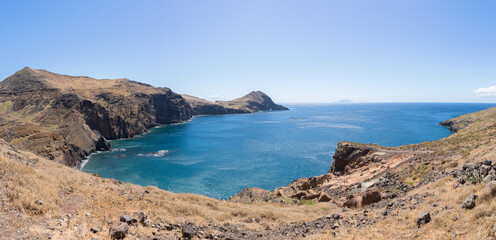 Fototapeta na wymiar Amazing panoramic view at the huge natural cliffs over the ocean, St. Lourenço Cape or Cabo de São Lourenço, on Madeira Island, Portugal