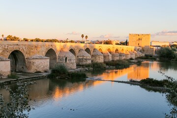 Fototapeta premium Roman Bridge of Cordoba in the historical center of Cordoba, Andalusia in southern Spain,