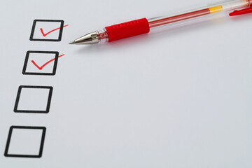 Red pen marking on checklist sheet
