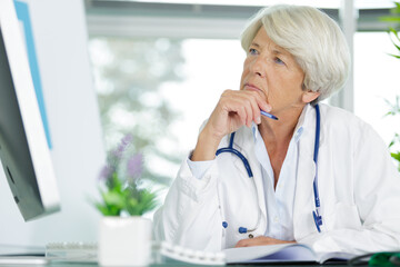 female nutritionist in her sixties working online