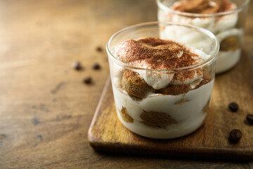 Traditional homemade tiramisu served in glasses
