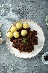 Homemade beef ragout with potato dumplings
