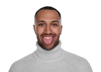 Happy young man showing his tongue on white background