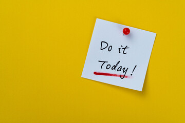 Do it today note on yellow background