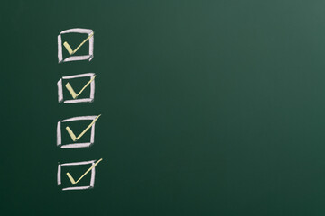 Checklist ticks on the chalkboard