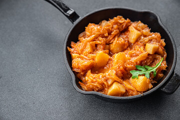 stewed cabbage with vegetables healthy meal food snack on the table copy space food background rustic top view keto or paleo diet veggie vegan or vegetarian food no meat
