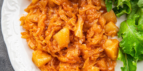 stewed cabbage with vegetables healthy meal food snack on the table copy space food background rustic top view keto or paleo diet veggie vegan or vegetarian food no meat