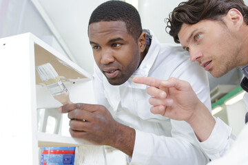 young apprentice painter in professional training
