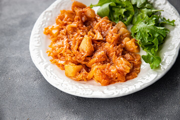 stewed cabbage with vegetables healthy meal food snack on the table copy space food background rustic top view keto or paleo diet veggie vegan or vegetarian food no meat