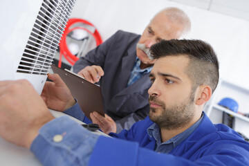 a man grading the apprentice