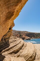 Vertical shot of rock formations on the coast of Korbous in Tunisia