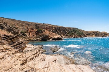 Seascape with rocky cliffs on the coast of Korbous, Tunisia