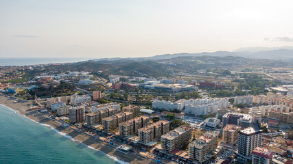 Fototapeta premium Fuengirola Spain, Aerial view on Coast of sea and buildings. Drone photo of coastal town