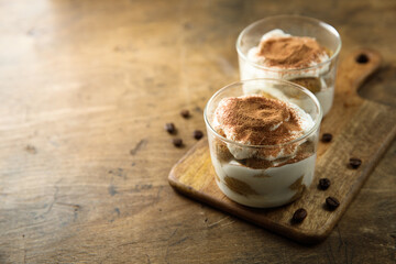 Traditional homemade tiramisu served in glasses