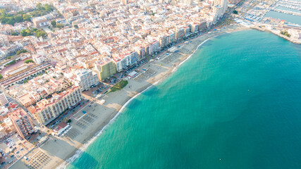 Fototapety  Fuengirola Spain, Aerial view on Coast of sea and buildings. Drone photo of coastal town
