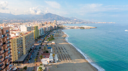 Fototapeta premium Fuengirola Spain, Aerial view on Coast of sea and buildings. Drone photo of coastal town