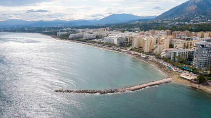 Obraz premium Fuengirola Spain, Aerial view on Coast of sea and buildings. Drone photo of coastal town