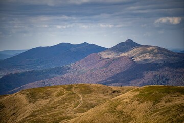 Drone shot of hills covered with autumn forests, cool for background