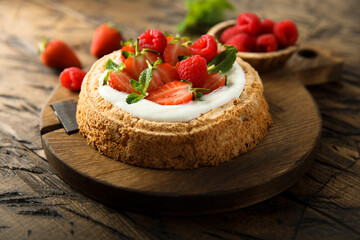 Homemade berry cake with vanilla cream