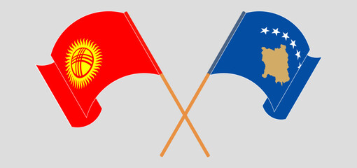 Crossed and waving flags of Kyrgyzstan and Kosovo