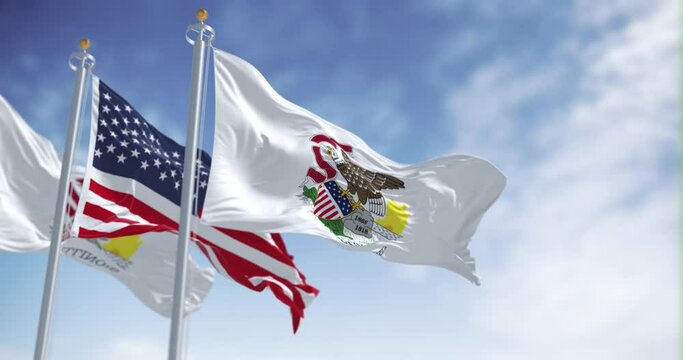 Seamless loop in slow motion of Illinois and US flags waving on a clear day