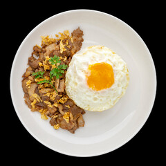 Khao Moo Tod Kratiam Kai Dao, Thai food, streamed rice topped with fried pork with garlic and fried egg in white ceramic plate isolated on black background, square ratio, top view