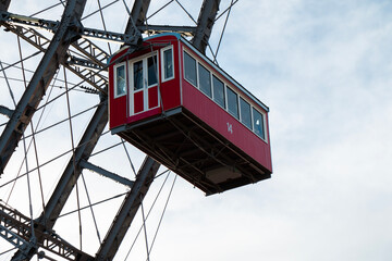 Close up of a ferris wheel in Prater, Vienna with blue sky in the background