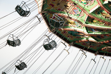 Close up of a spinning empty carousel in Prater, Vienna