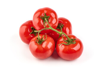 Tomato branch. Ripe fresh tomatoes, close-up, isolated on white background.